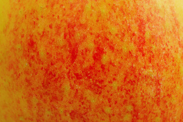 Texture of red and yellow apples as a background macro photo.