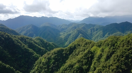 Naklejka premium Lush green mountain range landscape, scenic vista, cloudy sky background, ideal for travel brochures