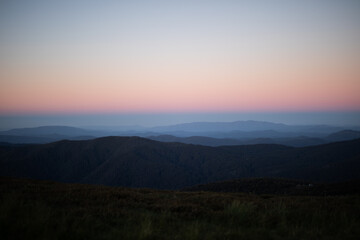mountain range orange sunset clouds sky