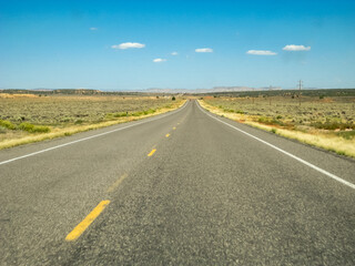 A long, empty road with no cars or people