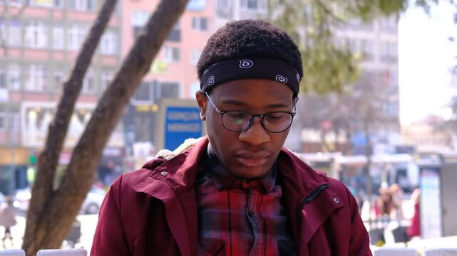 African Man Sitting in the Park
