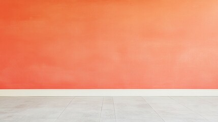 A smooth, orange wall with a light-colored floor, creating a warm, inviting atmosphere.