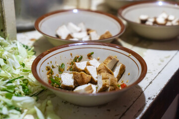 tofu slices in the bowl, healty food, vegan food
