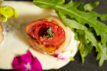 sauteed scallops on a plate
