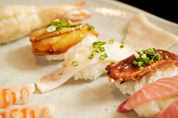 Different types of sushi on a plate