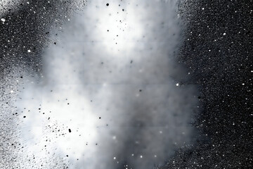 Obraz premium An abstract explosion of white smoke and particles against a dark background, creating a dramatic and dynamic visual effect.
