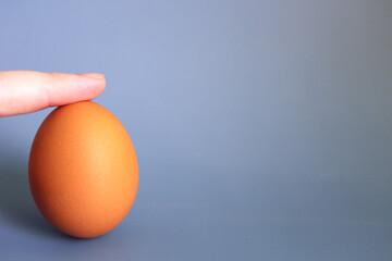 Easter basket full of eggs ,on blue background and isolated on white background.