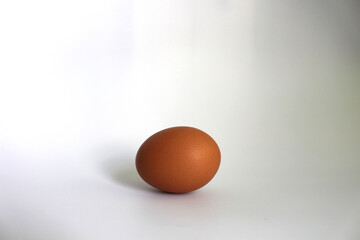 Easter basket full of eggs ,on blue background and isolated on white background.