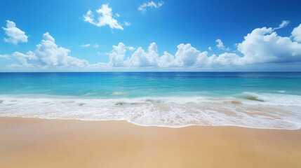 Obraz premium Tropical Sandy Beach with Soft Blue Ocean Waves and Clear Water 