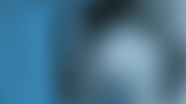 Blurred blue gray and white gradient background, ideal for background designs, web banners, social media posts, and presentation slides.
