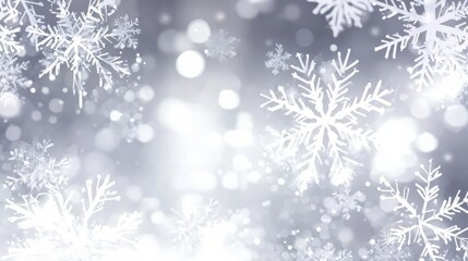 Winter background with the image of snowflakes falling on a background of a blurry snow drops