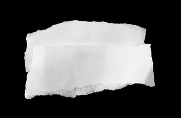 torn ripped paper on black background.