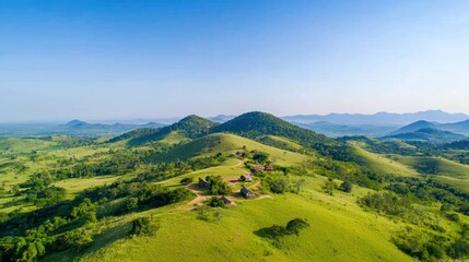 Fototapeta premium Aerial View of Lush Green Mountains