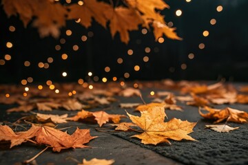 Autumn orange leaves scattered on a dark background with twinkling golden lights, natural, ambiance, dusk, evening