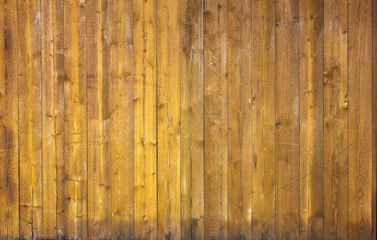 Yellow painted wooden plank wall