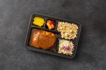 Various side dishes and hamburg steak lunch box
