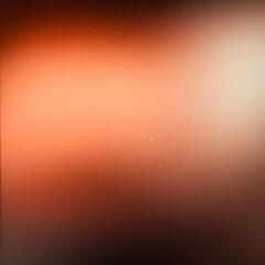 Abstract Orange and Beige Gradient Background Creates a Smooth Transition with Subtle Light Specks.
