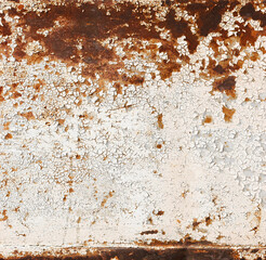 Old rusty metal texture with white peeling paint