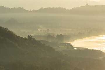 Landscape layers of mountain.Beautiful mountain landscape with fog and forest. Sunrise and sunset in mountains.