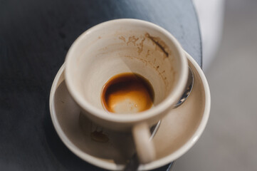 dirty empty coffee cup after drink High angle view of a cup of coffee