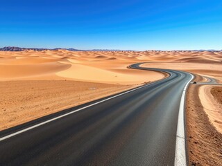 Asphalt road winding its way through a vast desert landscape under a clear blue sky with sandy dunes stretching out to the horizon, vastness, clouds, desert landscape