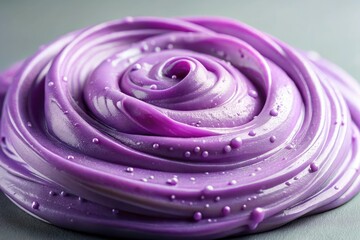 Close-up of lavender slime with purple and pink undertones on a light gray background, shades, pink undertones, close-up photography