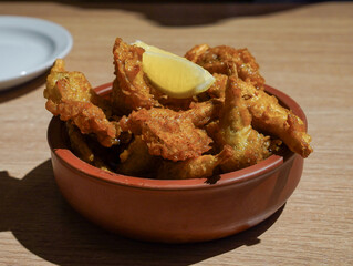 Crispy handmade chicken with lemon