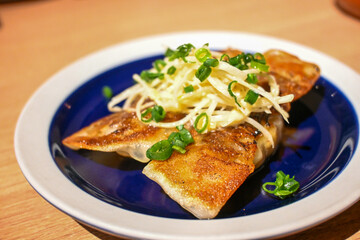 Handmade dumplings with fresh vegetables