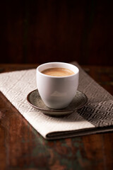 Cup of coffee on wooden background. Soft focus. Copy space.