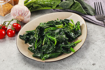 Coocked green spinach with oil