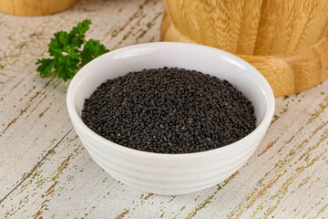 Black dry Nigella seeds in the bowl