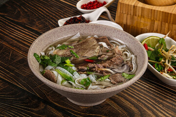 Vietnamese Pho Bo soup with beef and noodles