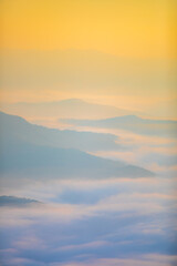 Closeup to sea fog at Sunrise time with sea of fog and clouds with mountain hill at Sri Nan National Park Doi Samer Dao Nan Province Thailand, Asia.