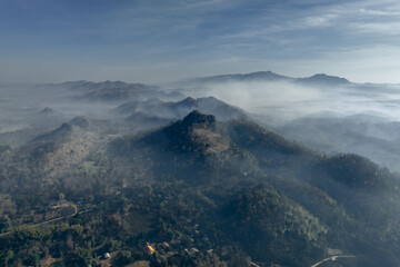 Beautiful mist over green forest on the mountain.
