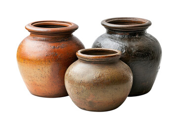 Traditional clay pottery displayed in a rustic setting showcasing craftsmanship and artistic design