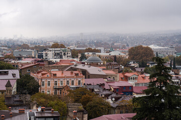 Old Tbilisi architecture in misty autumnal day