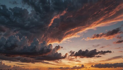 Fototapeta premium Beautiful sunset with clouds . A dramatic sky with dark and orange clouds .