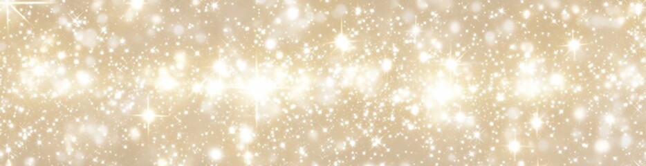 Sparkling gold and white bokeh lights background.
