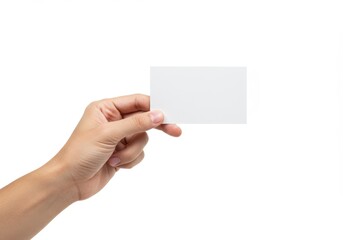Obraz premium A human hand gently holding a blank white card, symbolizing simplicity and versatility, isolated on a white background
