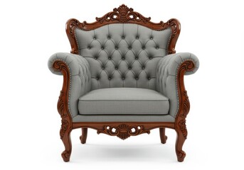 An ornate vintage armchair with a tufted gray upholstery and carved wooden frame, isolated on a white background