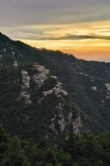 Sunset at Lushan, China and a pavilion.