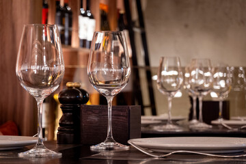 Empty wine glasses on a table at a fancy restaurant