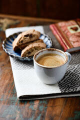 Cup of coffee and Cantuccini (Italian cookies) on dark wooden background. Copy space.	