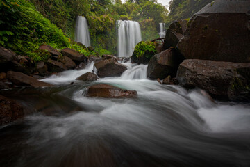 a beautiful view of  misty waterfall