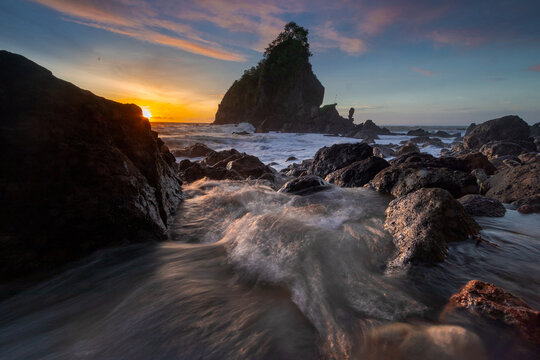 sunset on the karang agung beach kebumen
