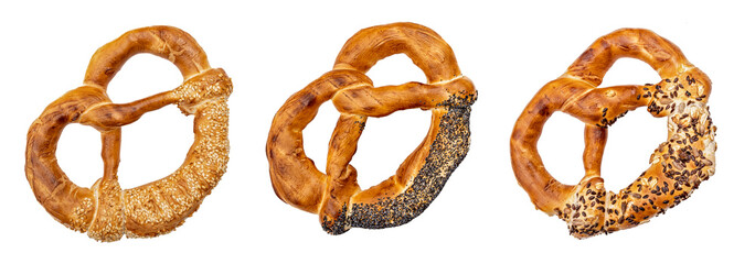 A collection of twisted braided pretzels with sesame, poppy, and many other seeds, a traditional snack from Romania