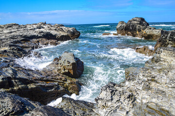 Waves crashing on the rocks in Cornwall