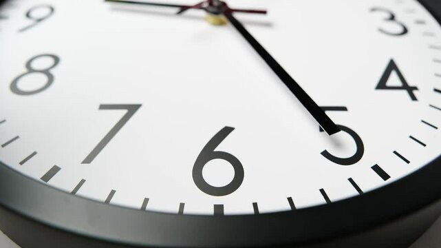 Classic wall clock. Clock face. Time lapse. Time running fast. Analog clock. Wall clock show running time. Close up in 4K, UHD