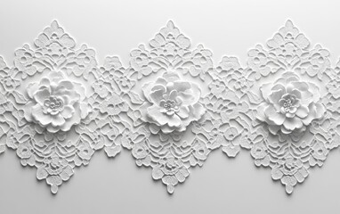 A white lace with three flowers on it