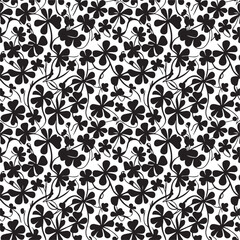 Black clover leaves on white background. St.Patrick 's Day. Isolated on white background. Abstract graphic black-white stock illustration. Template for coloring, textures and another design.